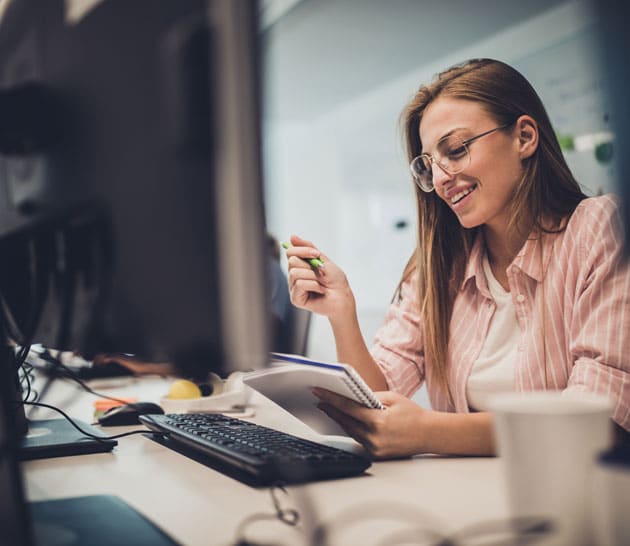 Female IT professional at her desk