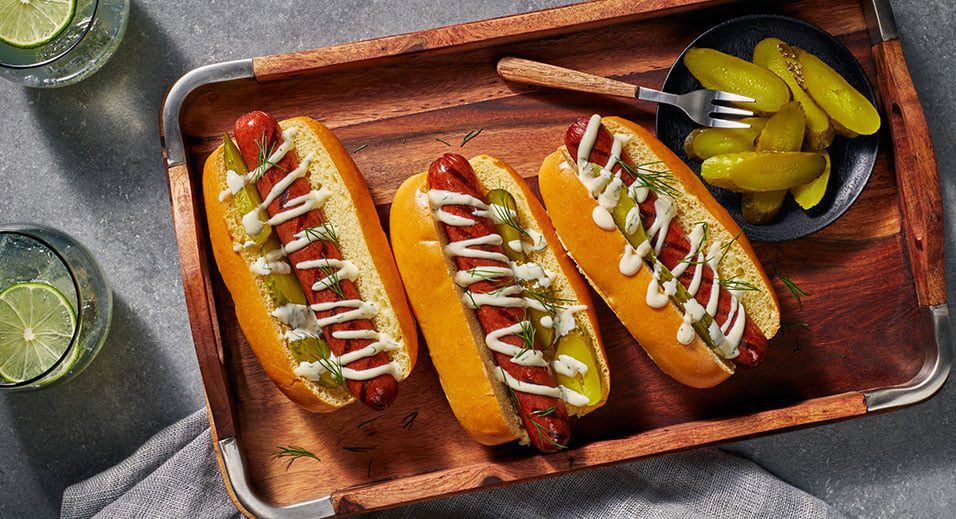 Are these hot dogs topped with pickles and mayo a sandwich?