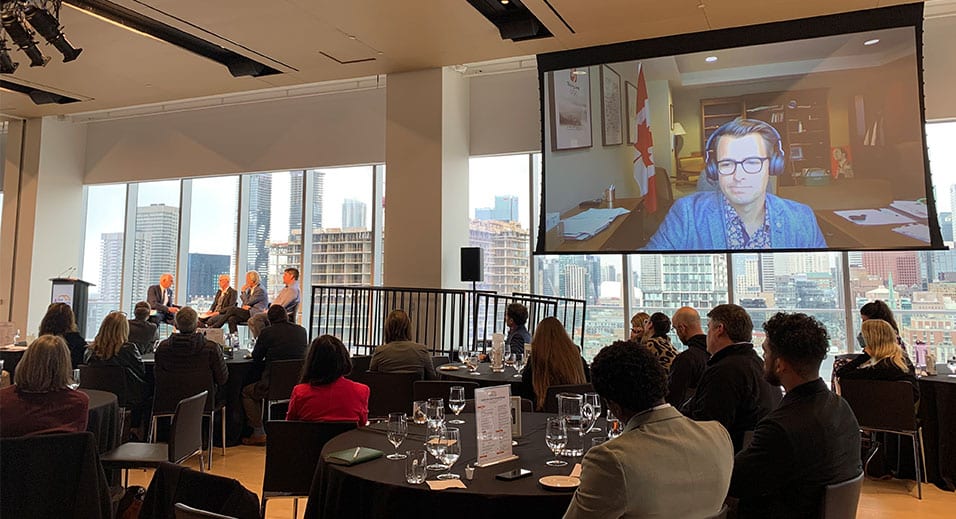 Moderator Dr. David Nabarro with panelists Kirsten Beardsley, Michael H McCain, and Dr. Joseph LeBlanc, and Adam van Koeverden joining the Food Security Symposium virtually