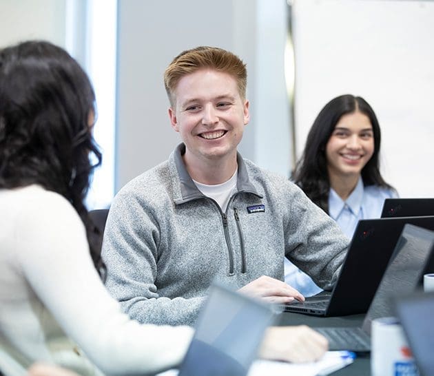 Team Members working together - New graduate jobs