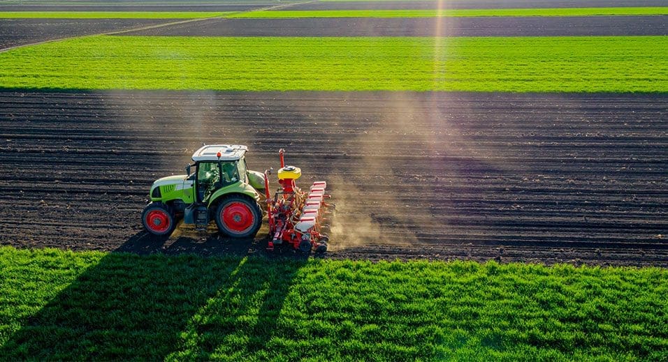 Regenerative Agriculture: tractor tilling a field