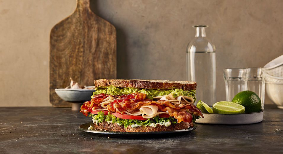 Maple Leaf Foods 2024 Integrated Report cover - sandwich made with bacon