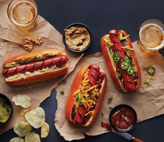 Hot-dogs Schneiders Juicy Jumbos dans des petits pains avec garnitures